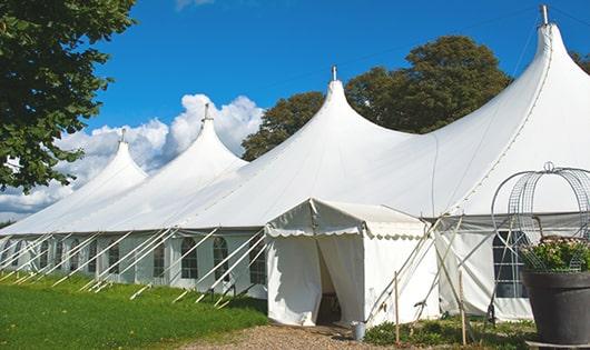 high-quality portable restrooms stationed at a wedding, meeting the needs of guests throughout the outdoor reception in Avoca